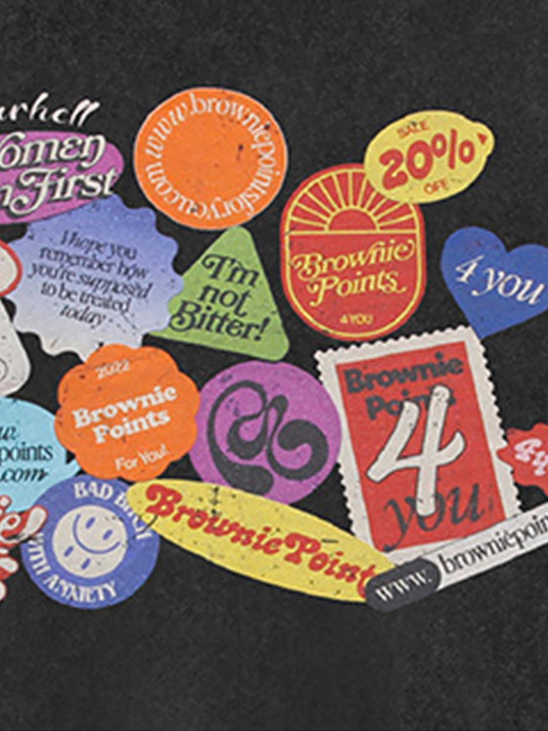 TALISHKO graffiti crew neck T-shirt showcasing colorful slogans and playful designs on a black background.