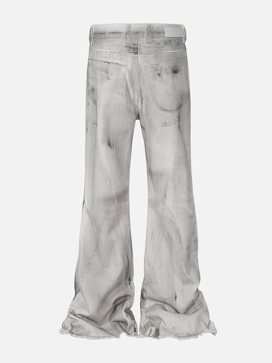Back view of graffiti deconstruction jeans by TALISHKO, featuring an artistic, distressed look.