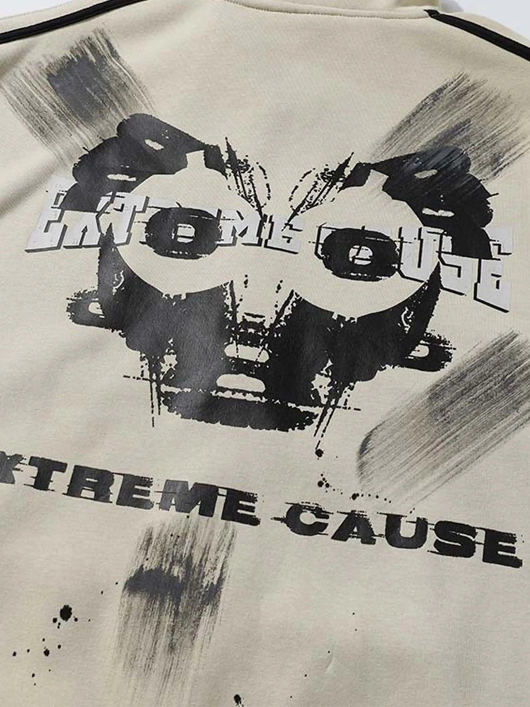 A close-up of TALISHKO's graffiti print jacket, showcasing unique artistic and bold patterns.