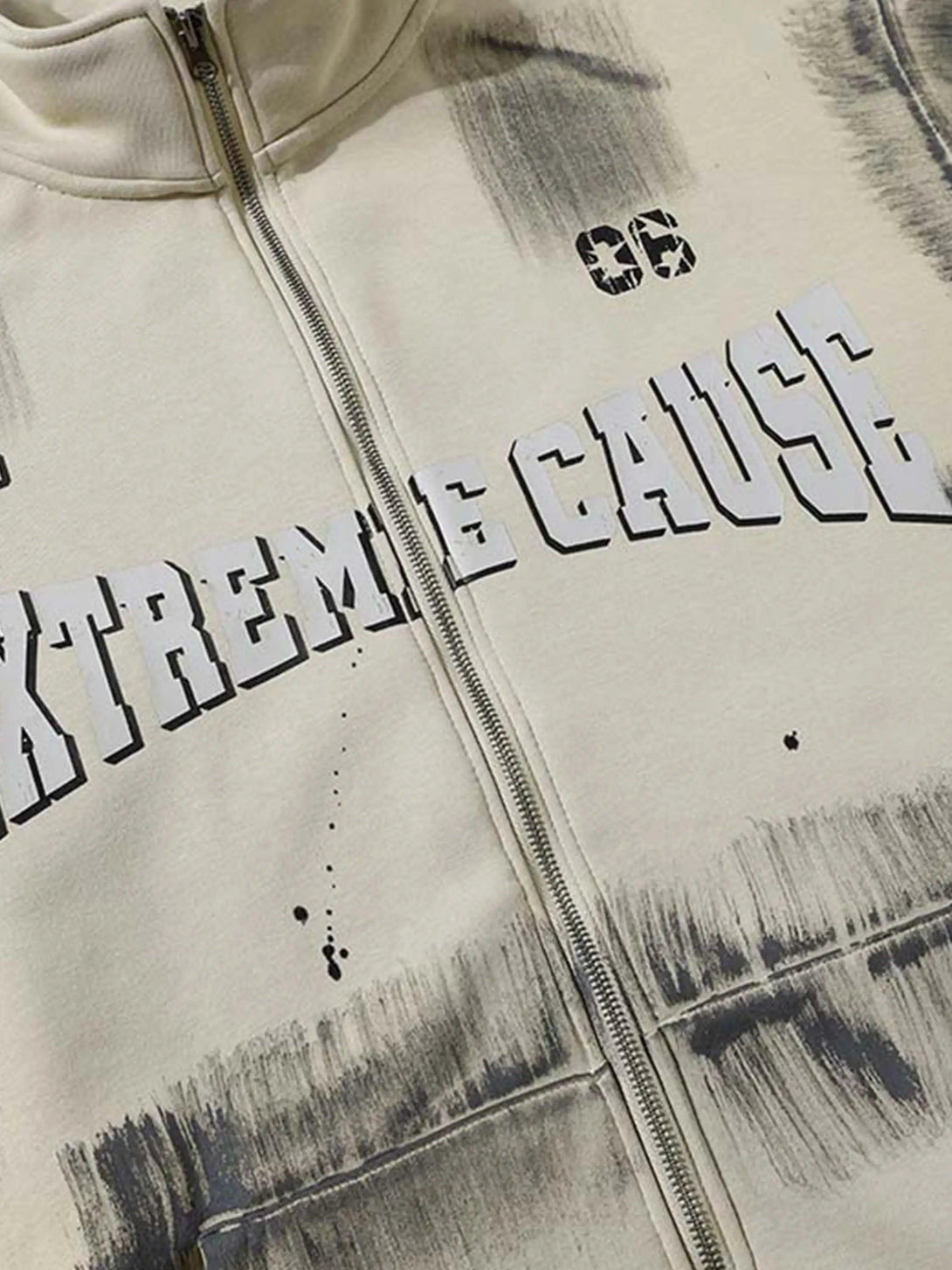 A detailed look at the graffiti print jacket by TALISHKO, highlighting unique artistic touches.