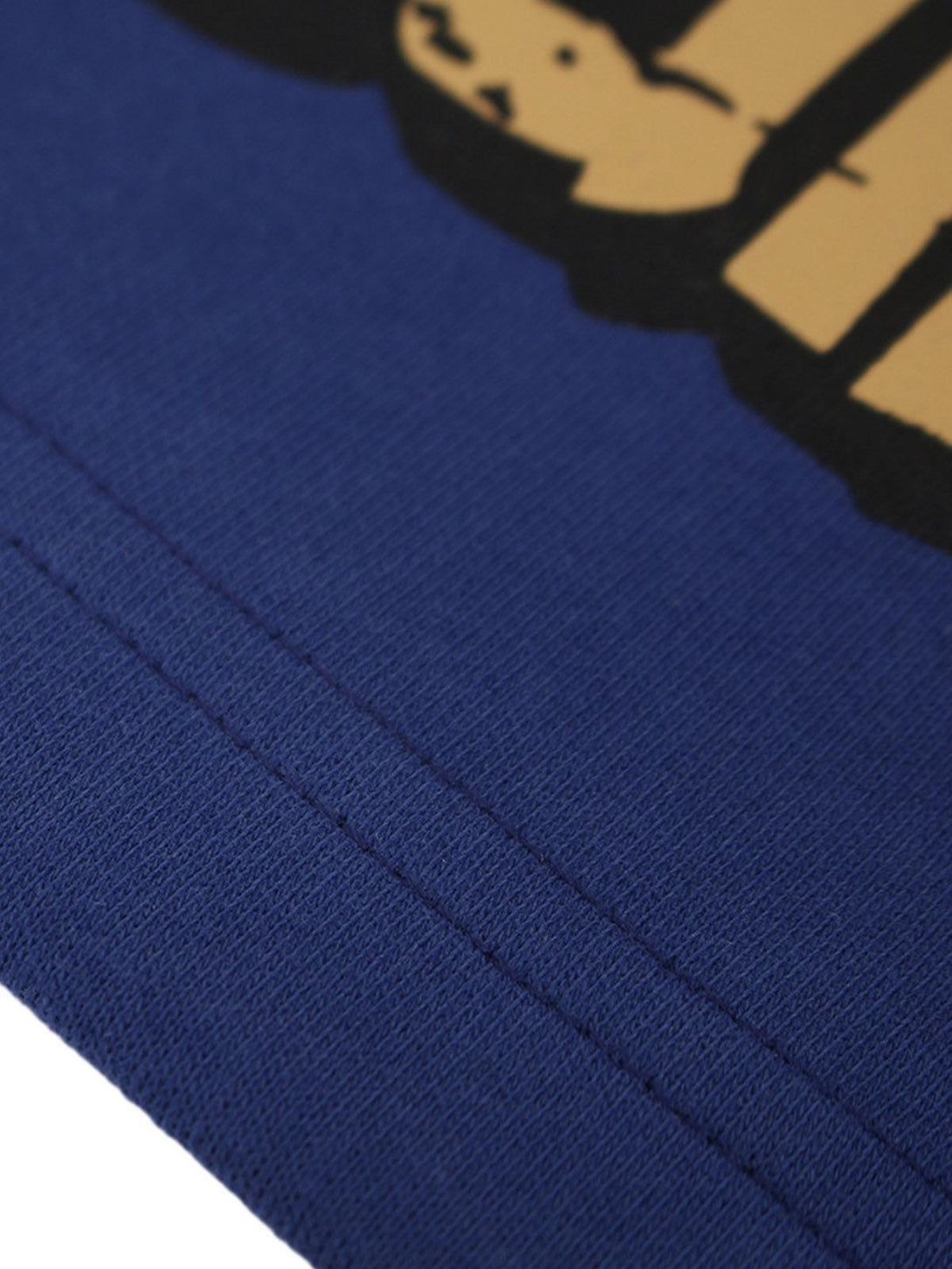 Intricate look at TALISHKO's blue cotton shorts, emphasizing the graffiti design detail.