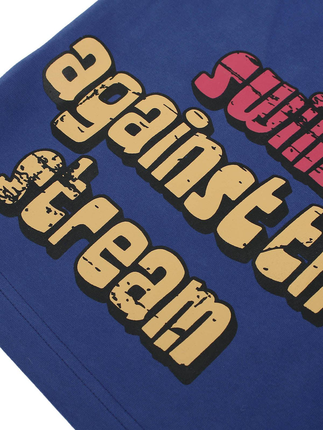 Bold lettering on TALISHKO's blue cotton shorts, showcasing graffiti-inspired design detail.