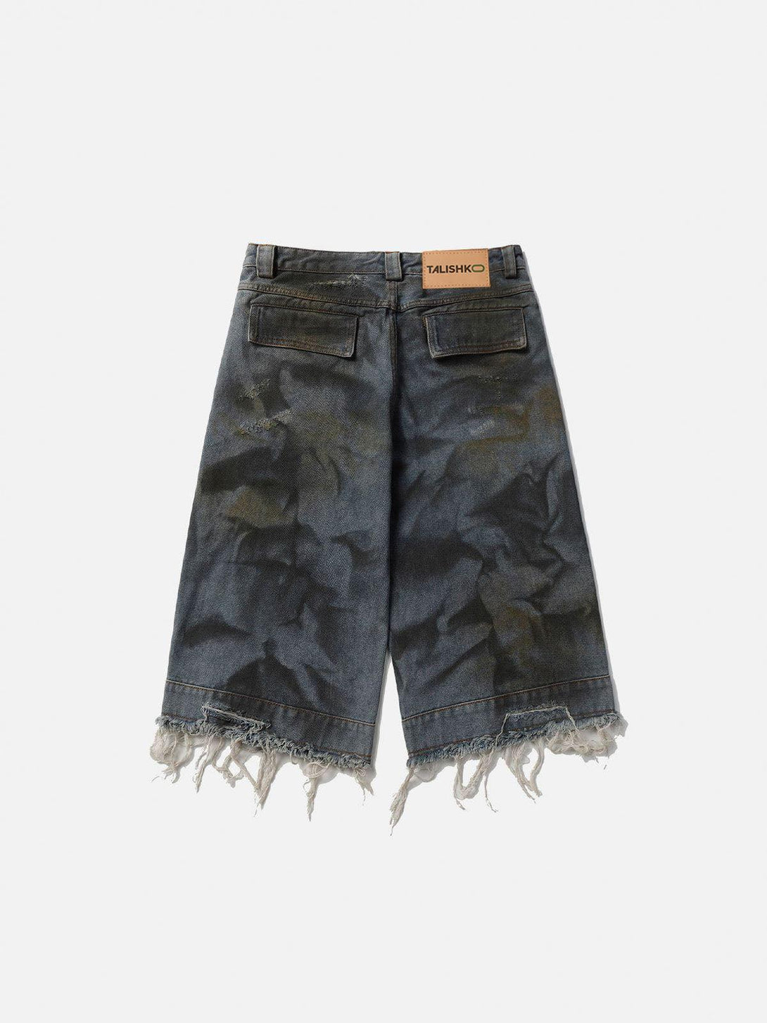 Back view of graffiti fringe jorts by TALISHKO, featuring a unique, distressed style.