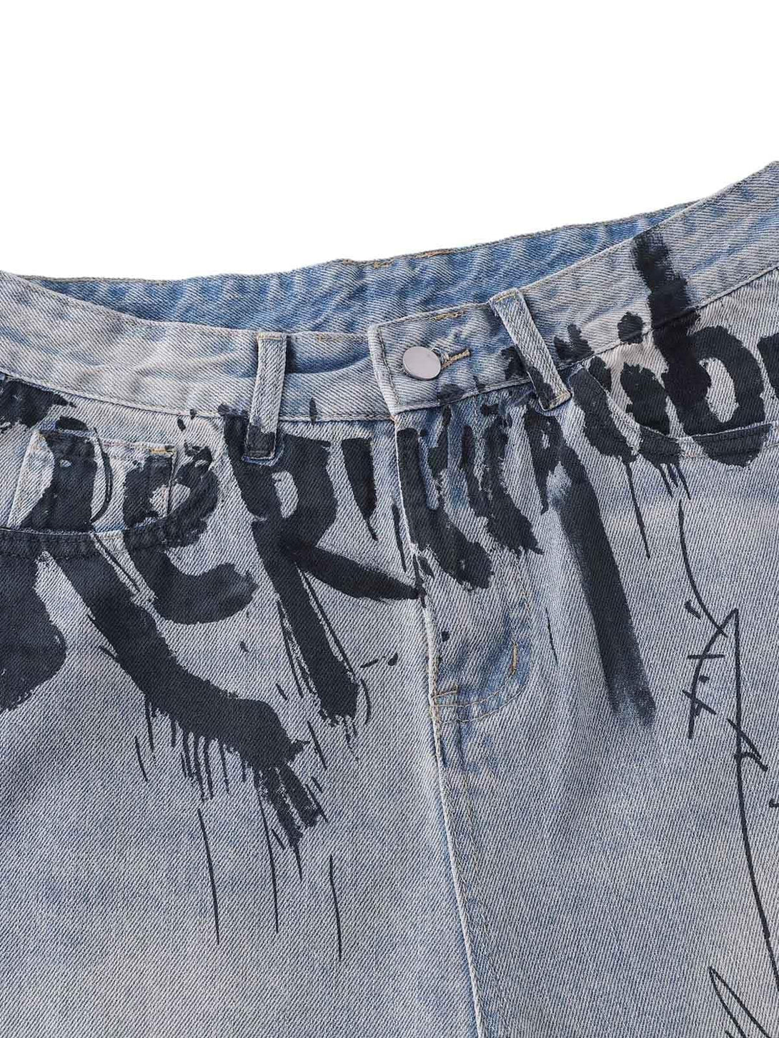 A close-up of TALISHKO denim shorts, highlighting bold graffiti-style lettering on the front.