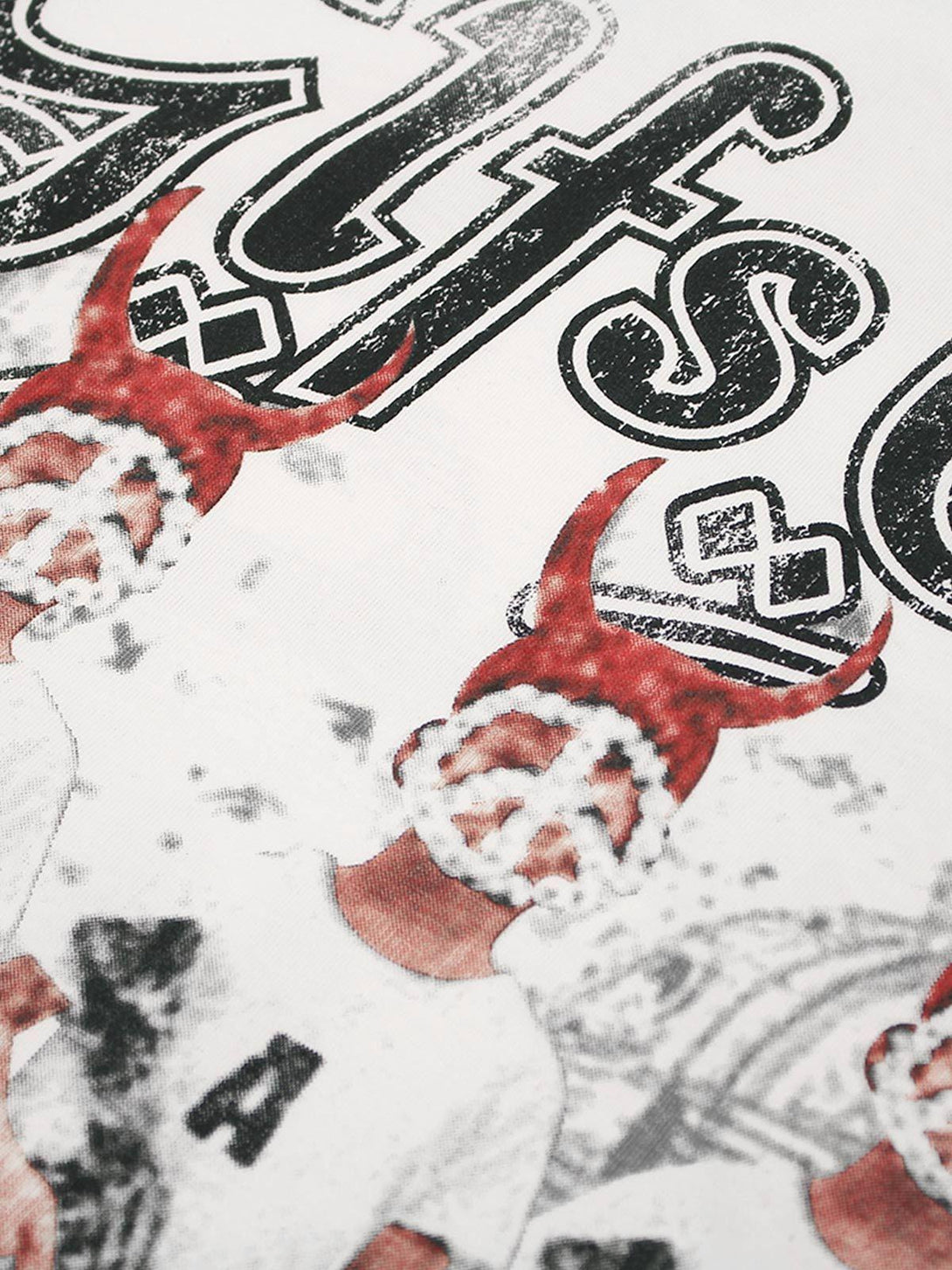 A detailed look at the devil-themed graphic by TALISHKO, showcasing bold graffiti elements.