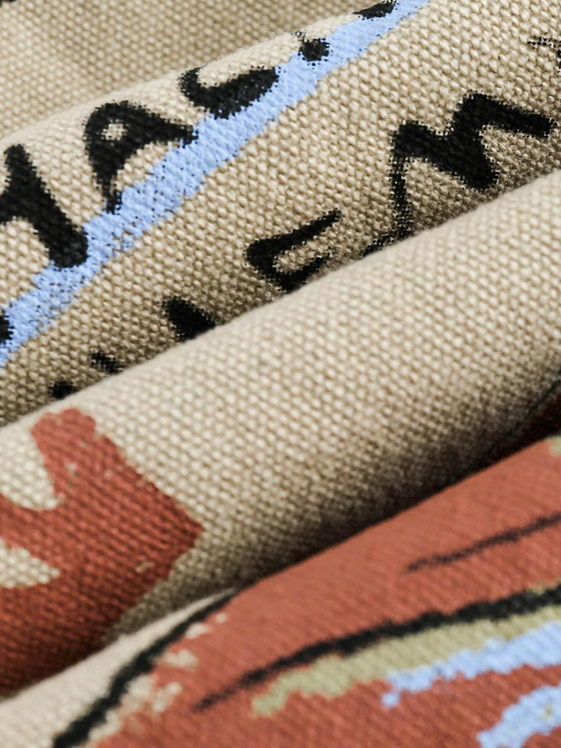 Intricate look at graffiti patterns and texture on the denim jacket by TALISHKO.