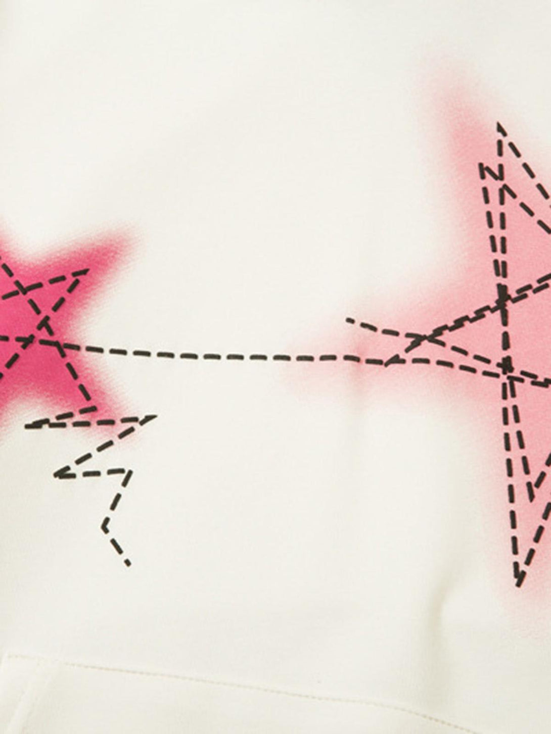Intricate look at the graffiti star pattern on a TALISHKO hoodie, featuring vibrant pink accents.