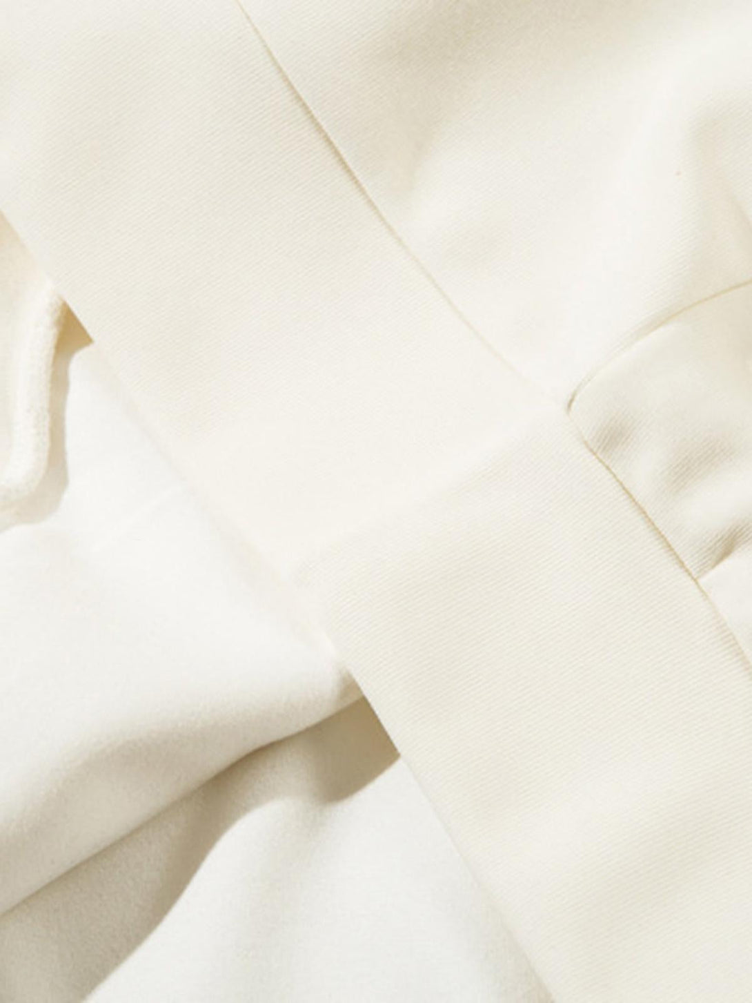 A close-up of the soft fabric and stitching on a TALISHKO hoodie, highlighting quality craftsmanship.