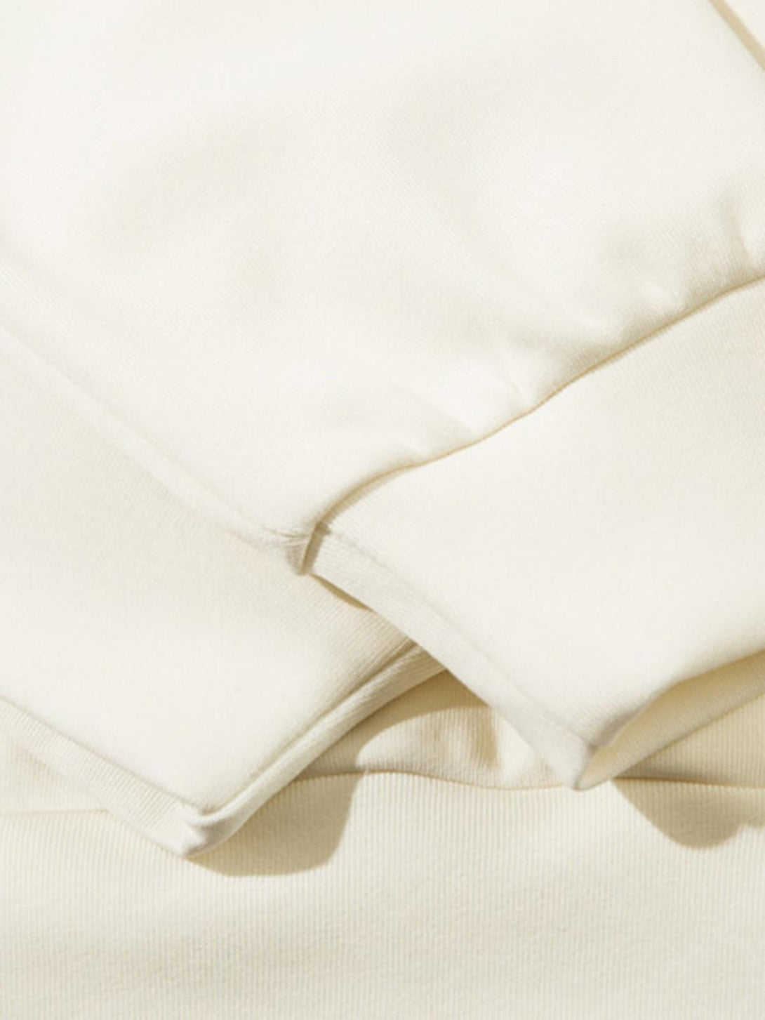 Soft fabric texture of a TALISHKO hoodie, highlighting its quality and comfort.