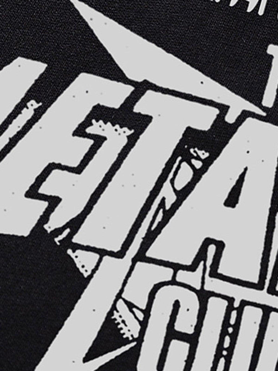 A close-up of the graphic design on a black vest by TALISHKO, showcasing bold typography.