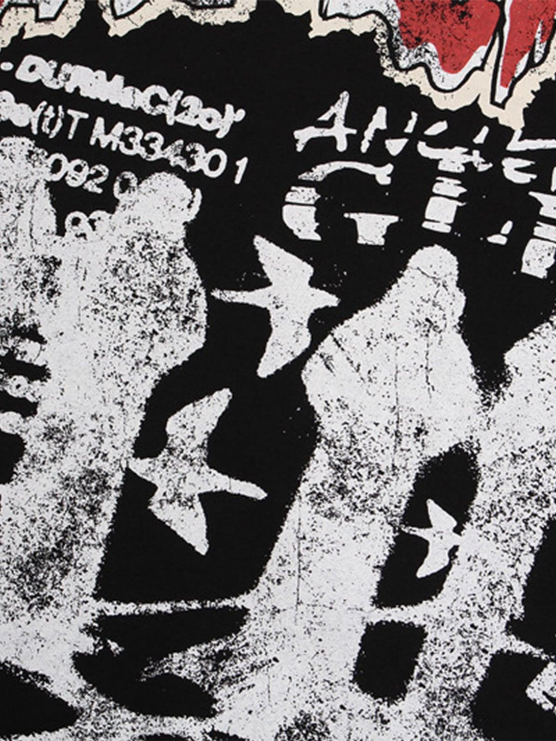 Intricate look at TALISHKO's graphic "BREAK" print T-shirt design, emphasizing edgy style.