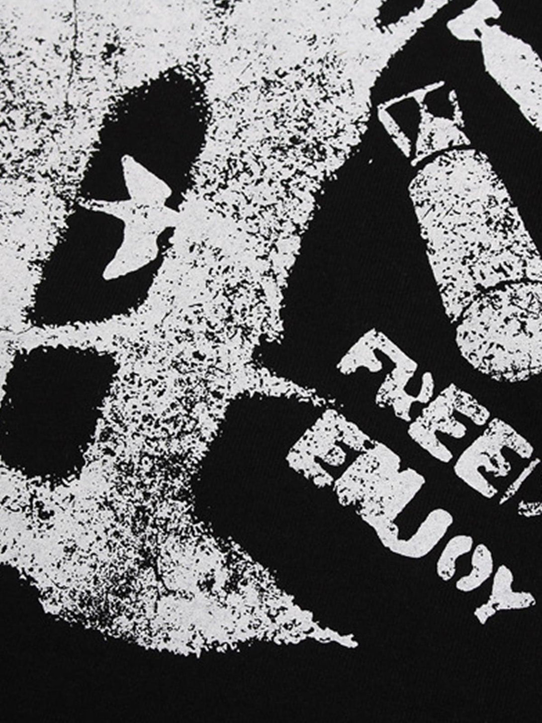 A tight crop highlighting TALISHKO's graphic "BREAK" print on a T-shirt, emphasizing the bold pattern.