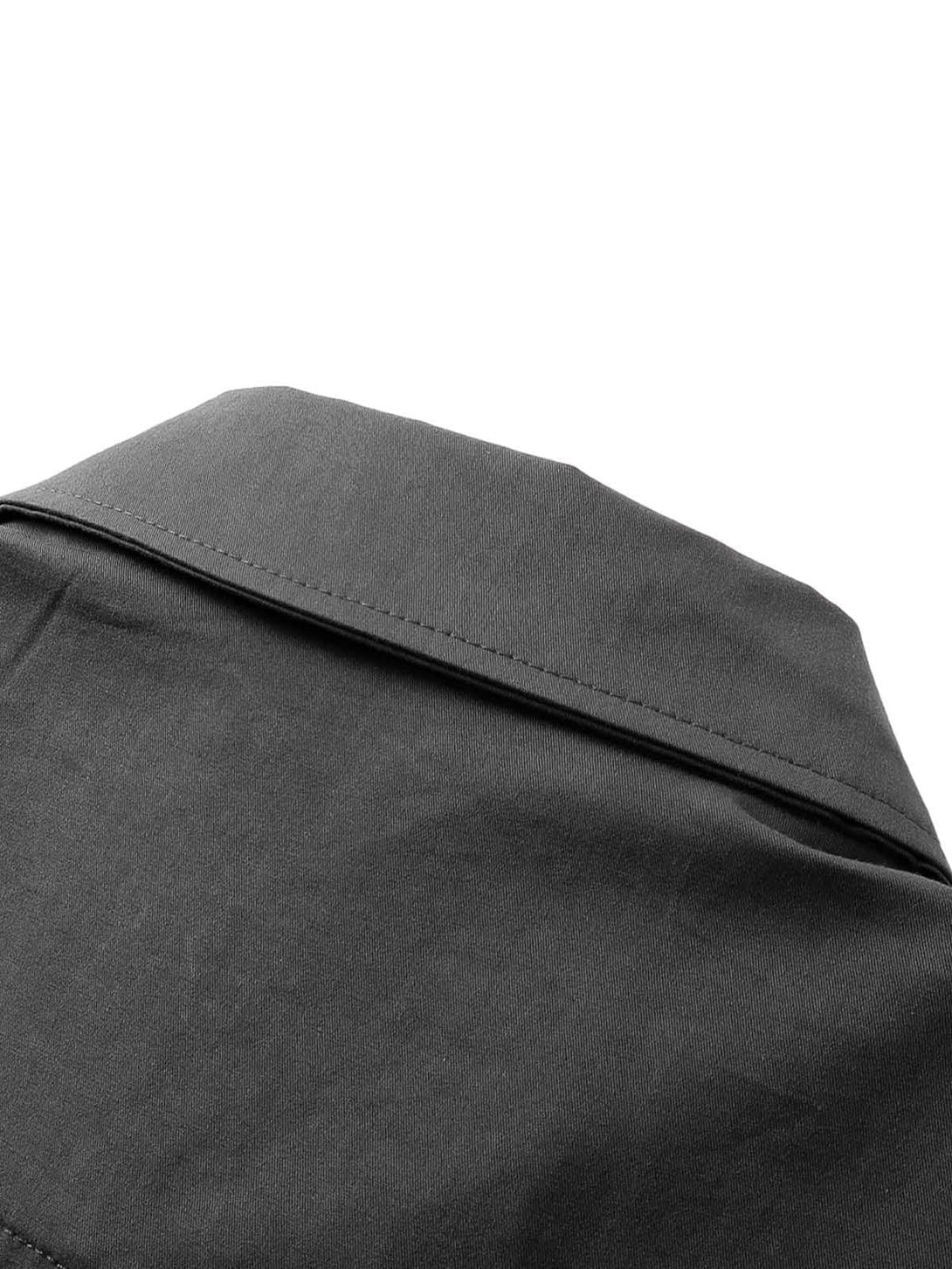 A detailed look at the dark gray shirt collar by TALISHKO, showcasing its stitching and fabric.