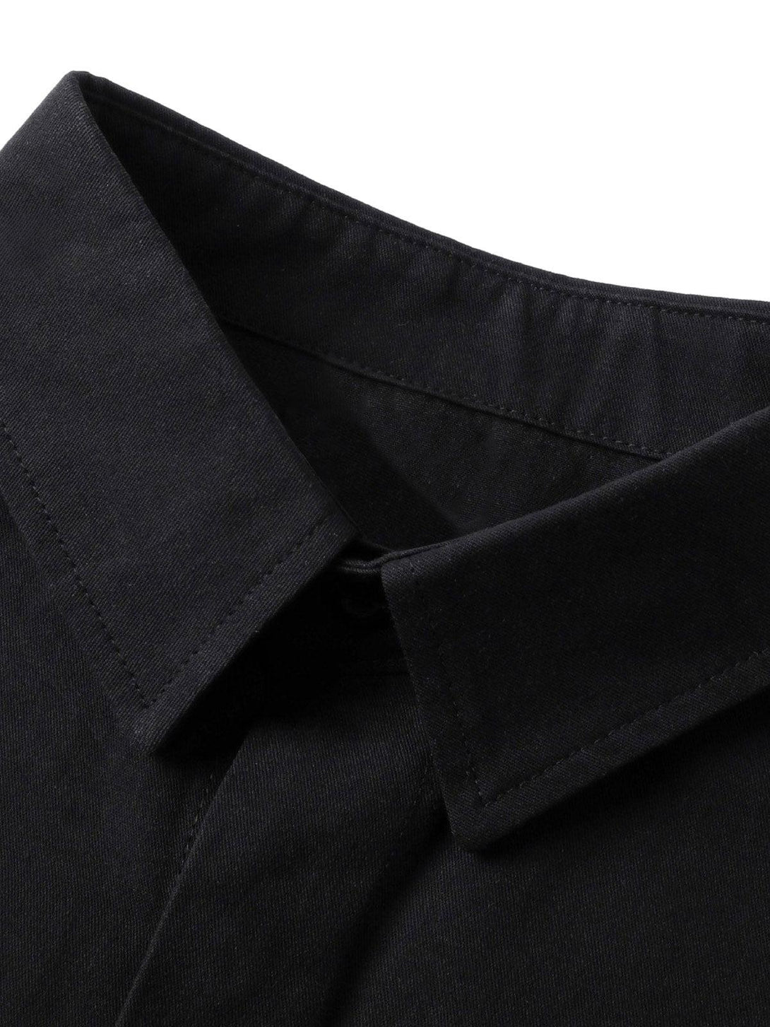 A detailed view of the collar on a black long-sleeve shirt by TALISHKO, showcasing sleek tailoring.