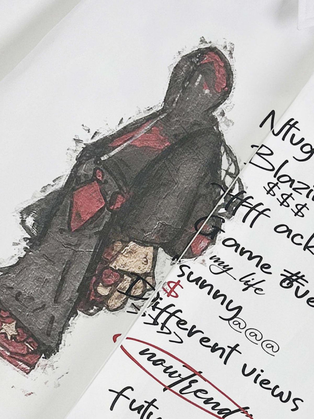 A close-up of a graphic print on a long-sleeve shirt by TALISHKO, showcasing artistic details.