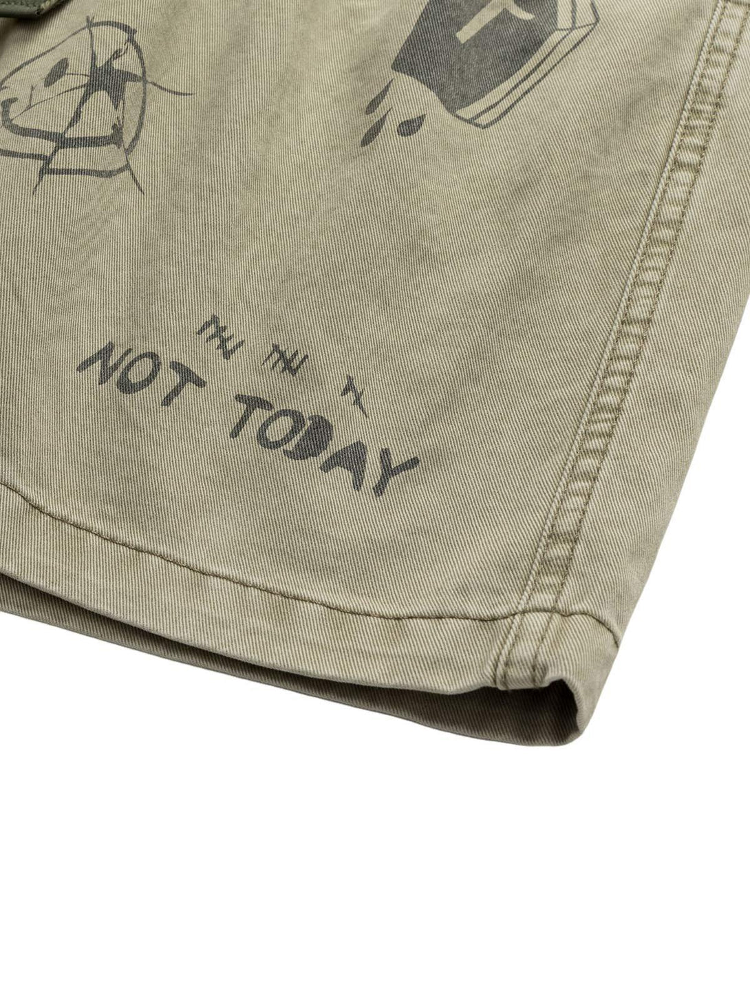 A zoomed-in view of TALISHKO shorts showcasing playful graphic prints and casual style.