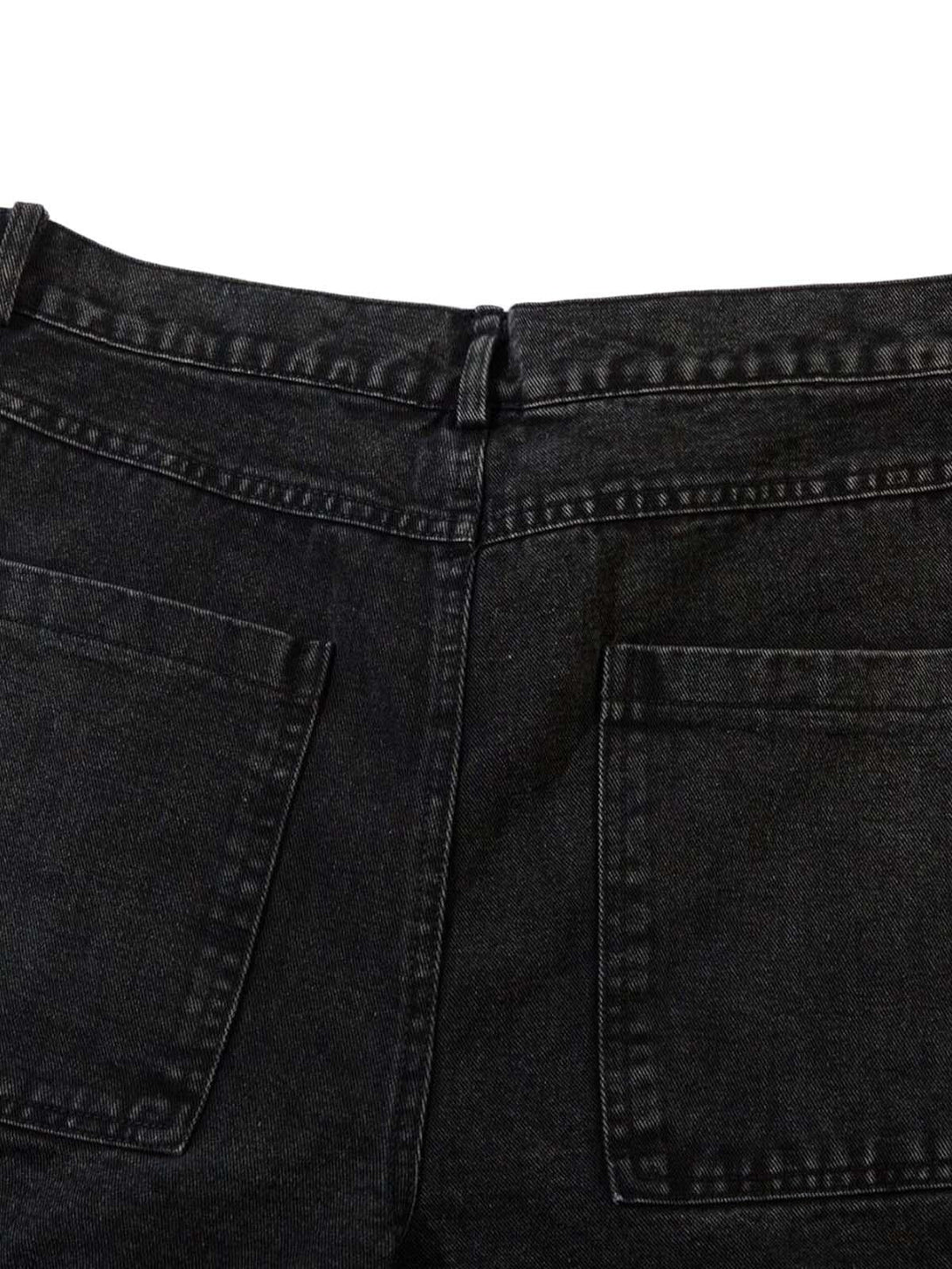 Rear view of TALISHKO cargo jeans, highlighting multi-pocket design and detailed stitching.