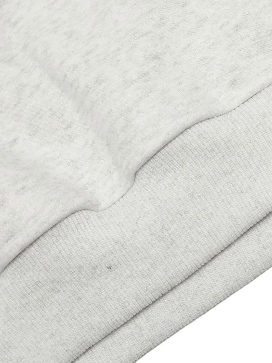 Intricate look at TALISHKO hoodie fabric, highlighting its soft texture and quality stitching.
