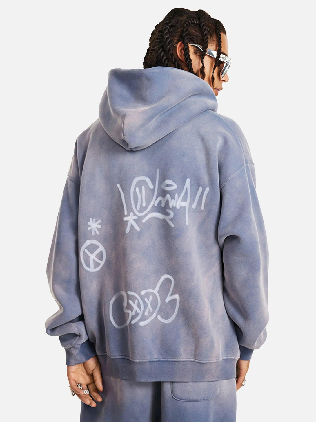 Back view of TALISHKO's graffiti hoodie, showcasing unique hand-drawn designs and street style.