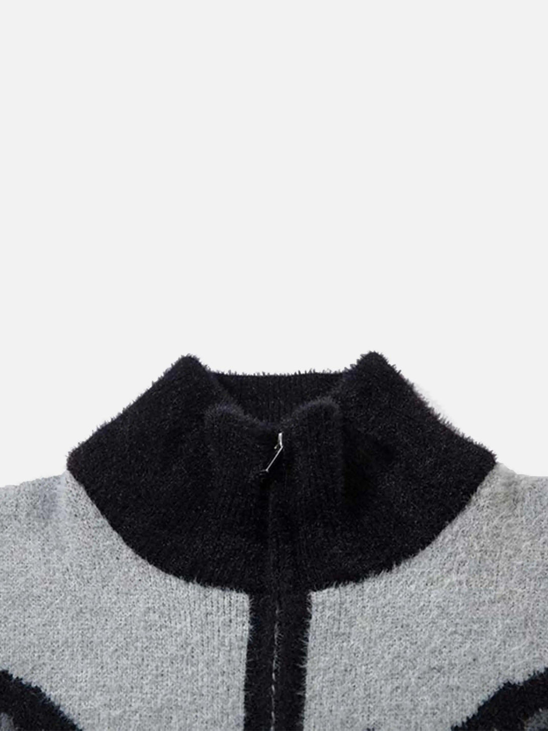 A zoomed-in view of TALISHKO's mohair cardigan, highlighting the textured black collar.