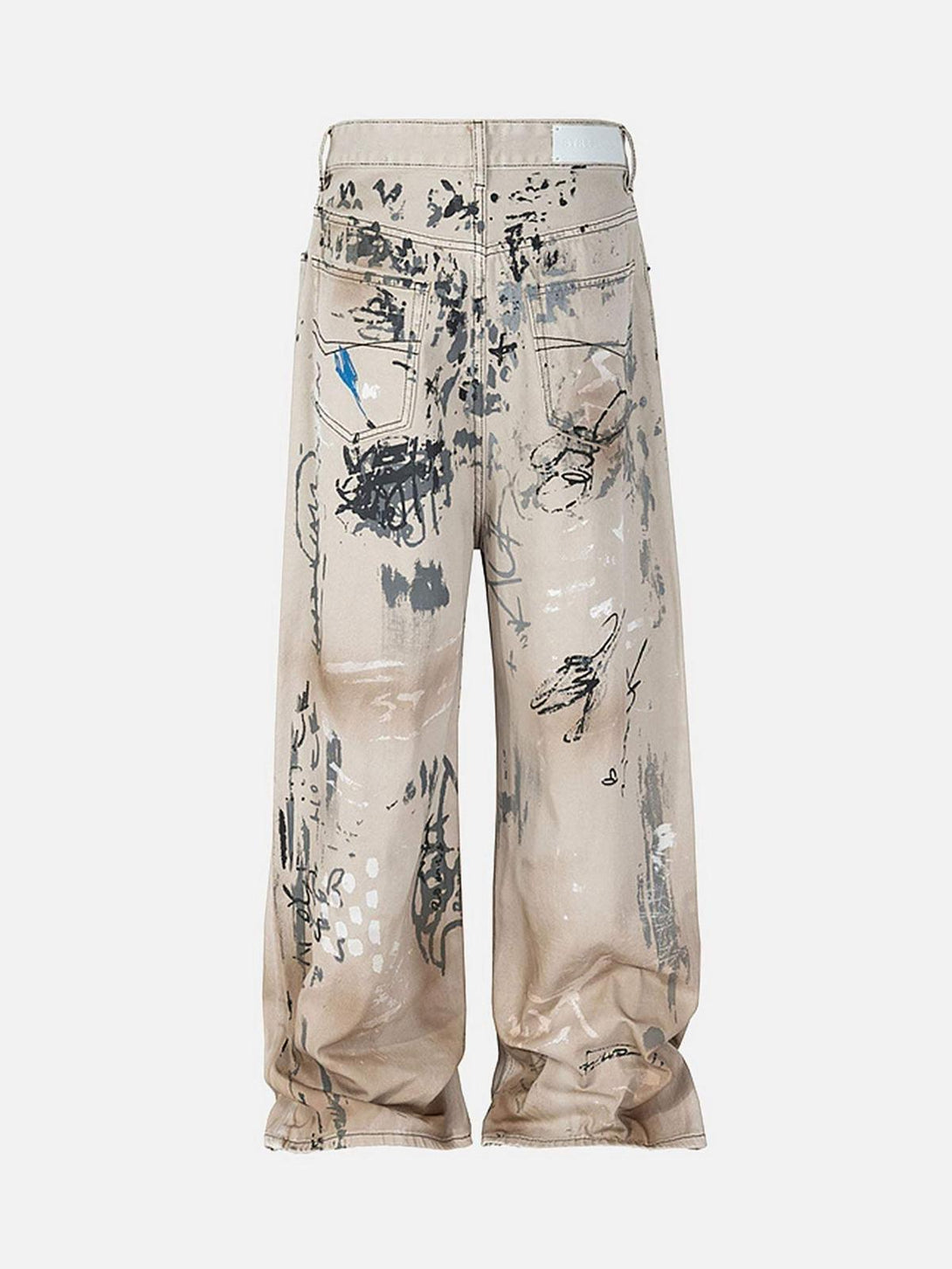 Back view of TALISHKO hand-painted graffiti baggy jeans, highlighting unique artistic design.
