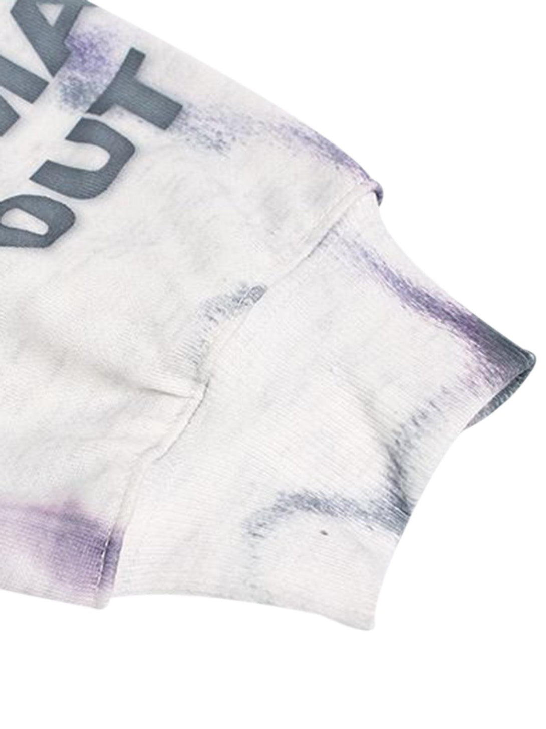 Detailed view of the hand-painted ink design on a TALISHKO hoodie, highlighting unique artistry.