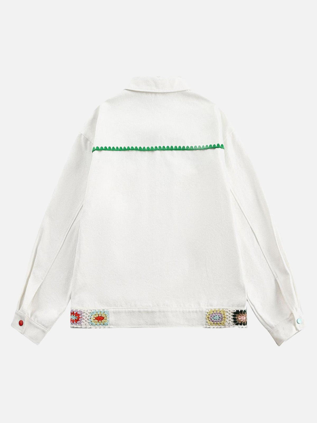 Back view of TALISHKO denim jacket with colorful crochet floral accents and green trim.