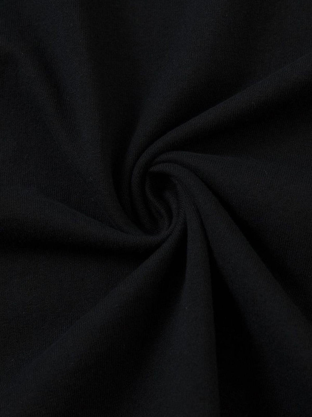 Zoomed-in texture of TALISHKO's heavy cotton fabric, showcasing its rich black hue.