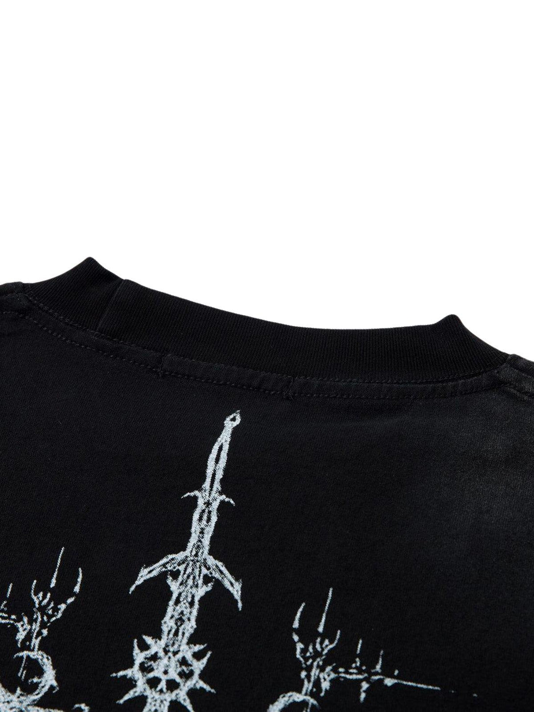 A close-up of the intricate cross shield design on TALISHKO's heavy cotton T-shirt.