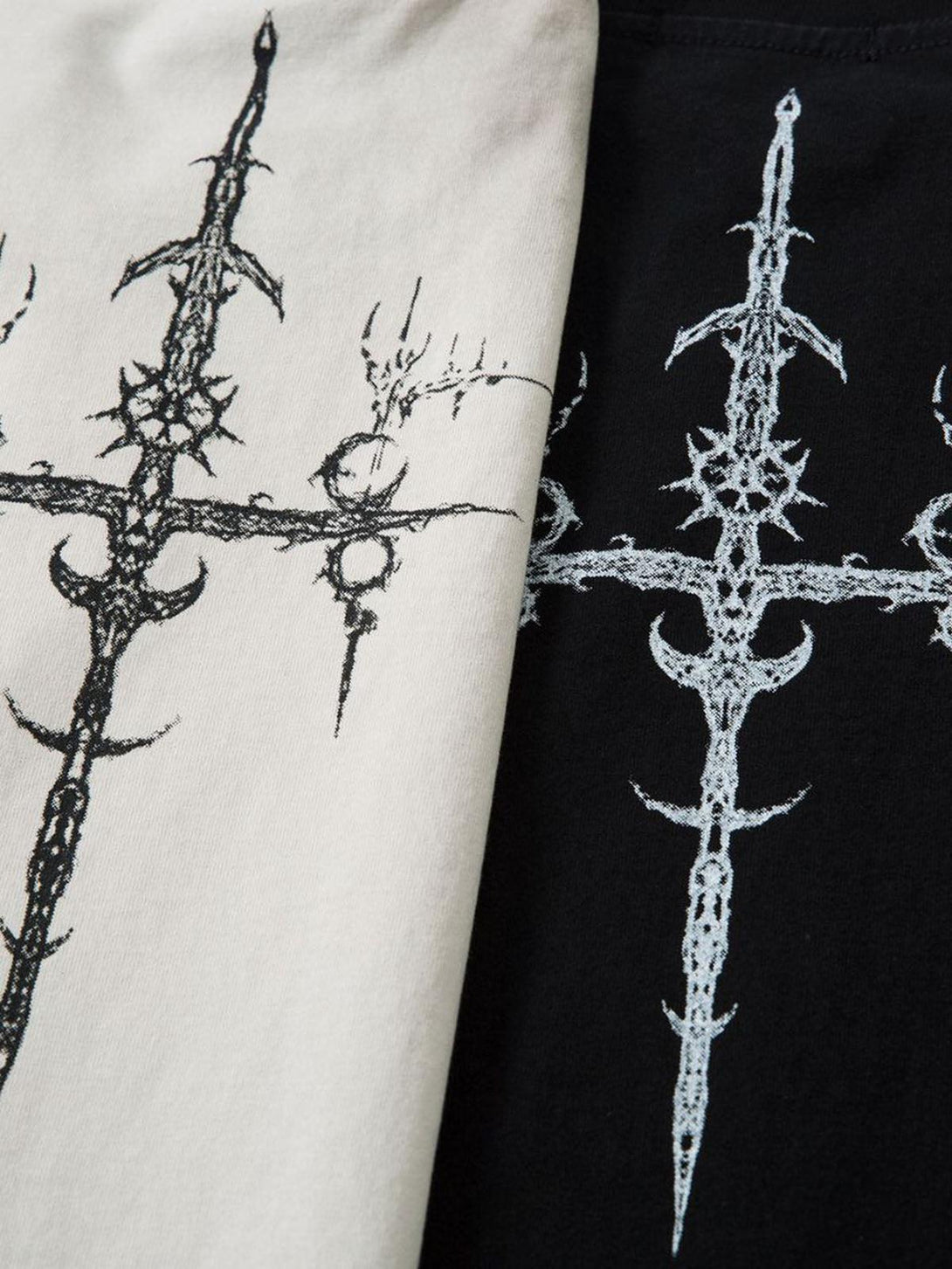 A detailed view of TALISHKO's heavy cotton T-shirts, showcasing the cross shield design.