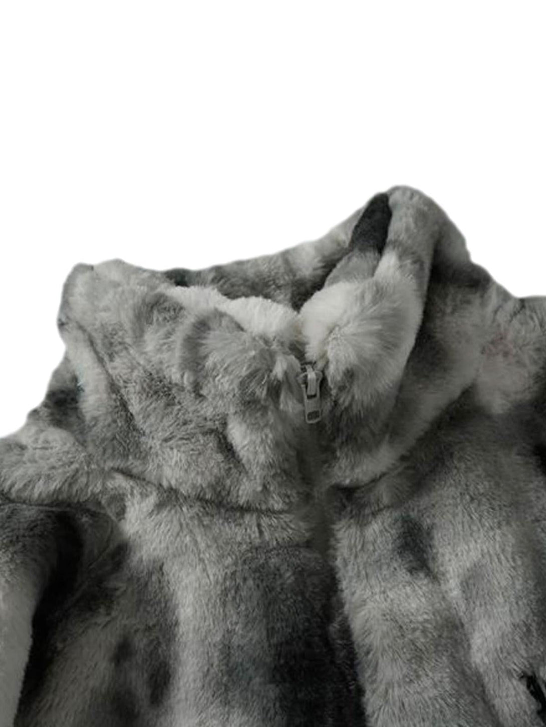 Focusing on TALISHKO's plush faux lambswool texture in a tie-dye urban jacket close-up.