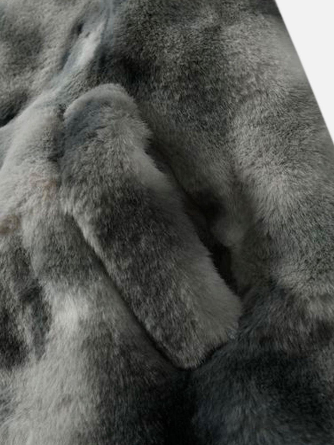 Texture and pattern showcased in TALISHKO's tie-dye faux lambswool jacket.