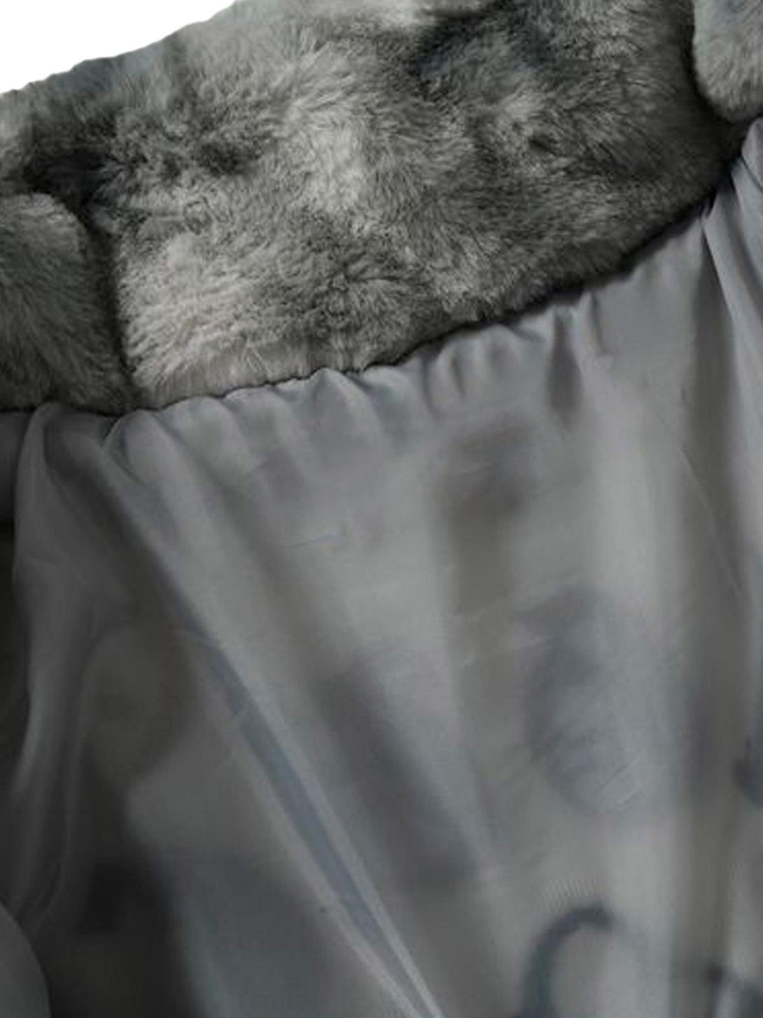 Soft faux lambswool lining in TALISHKO's tie-dye urban jacket, showcasing plush texture.