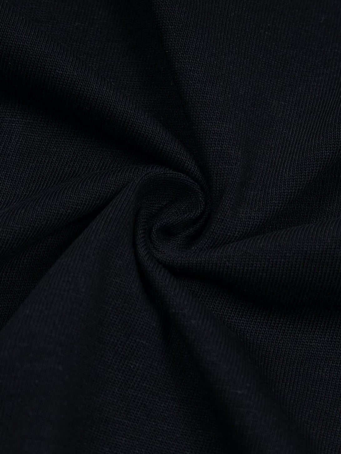 Zoomed-in texture of black fabric by TALISHKO, highlighting its detailed and rich weave.