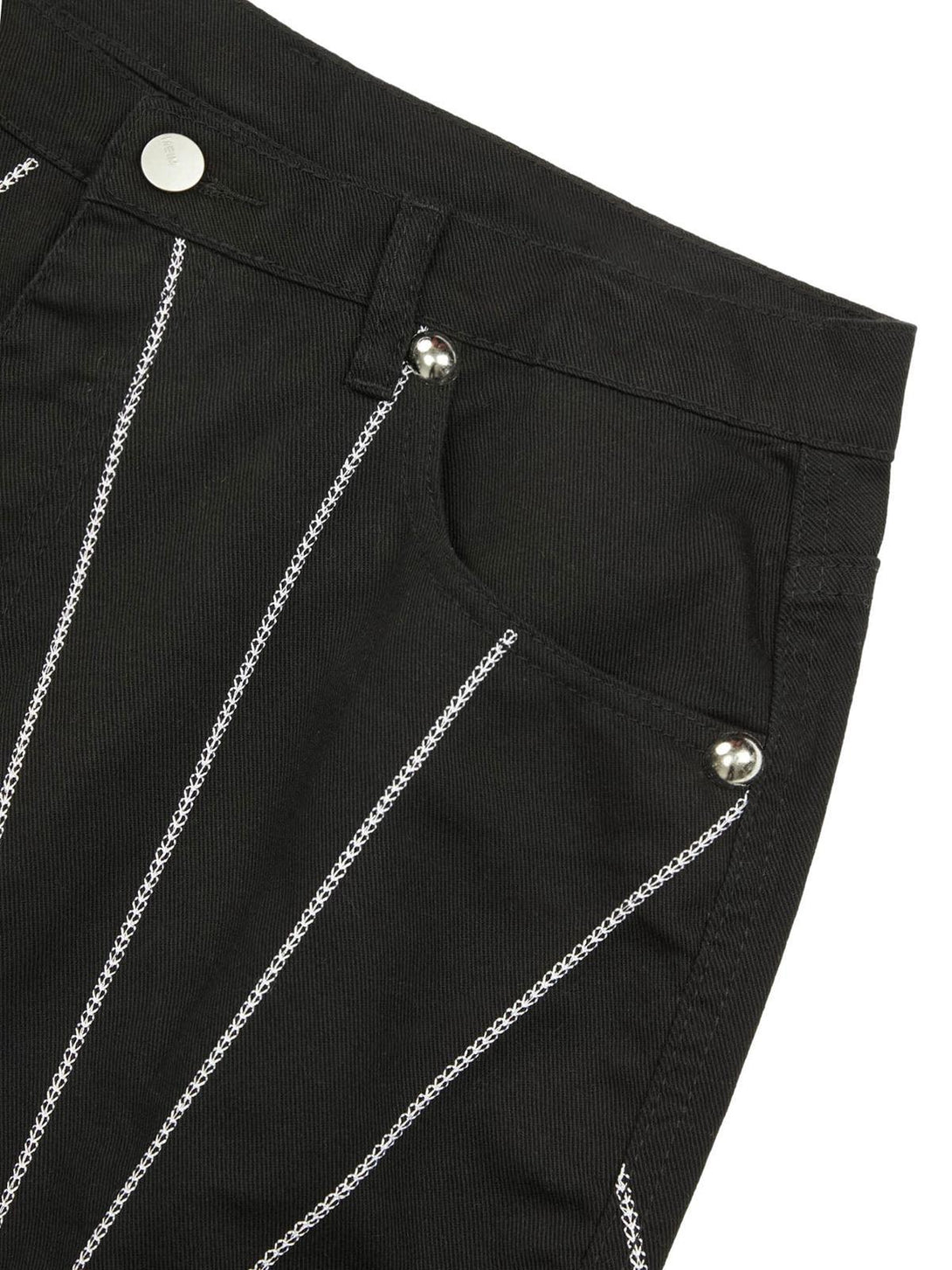 Intricate look at spider web embroidered stitching on black jeans by TALISHKO, showcasing edgy detail.