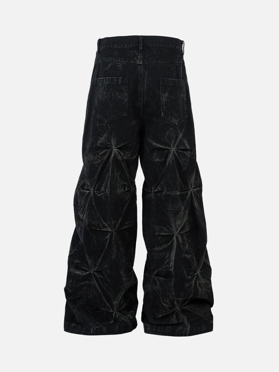 Back view of TALISHKO baggy jeans showcasing distressed pleats and washed texture.