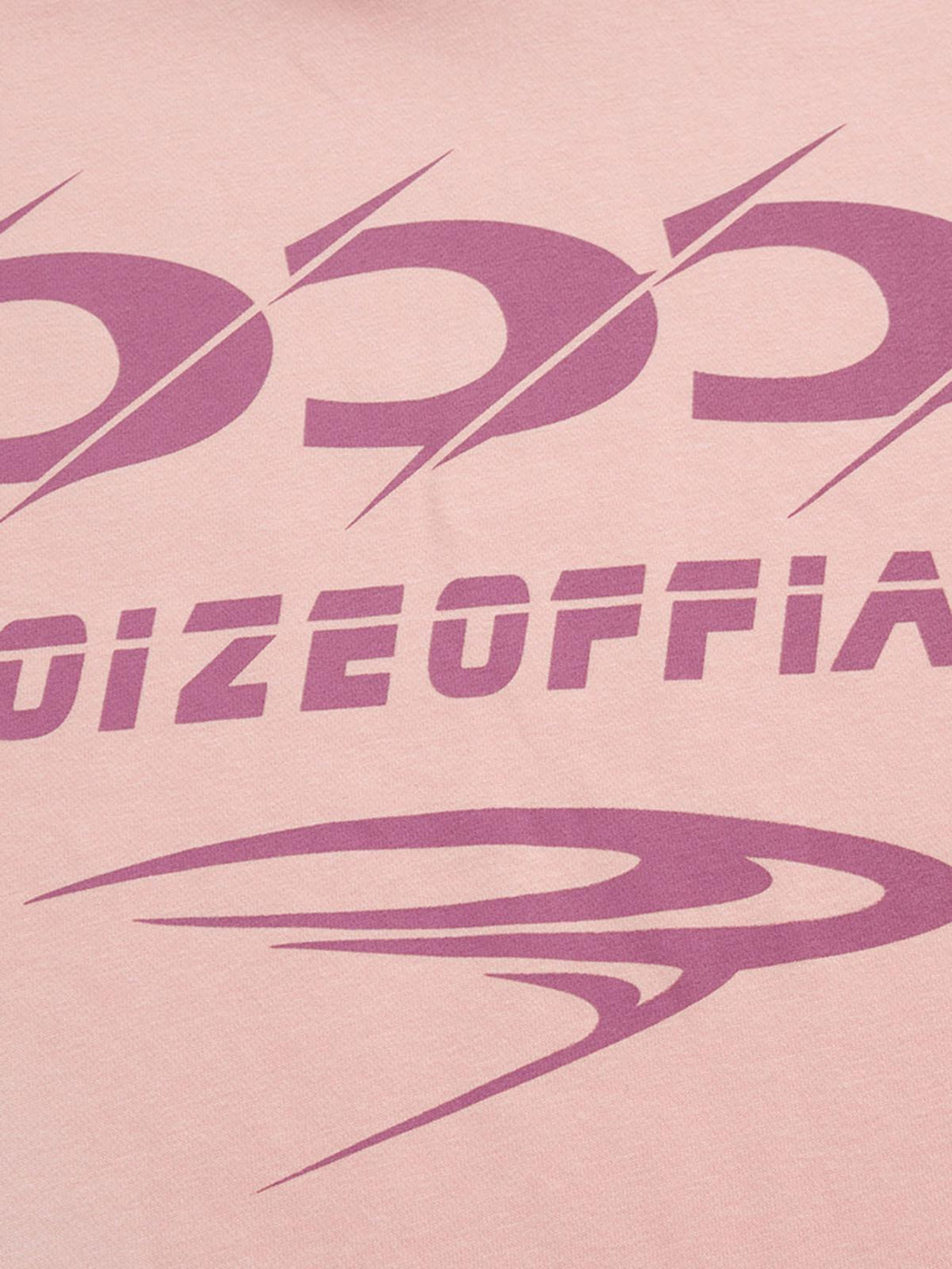 Zoomed-in view of TALISHKO hoodie, highlighting bold purple graphics on soft pink fabric.