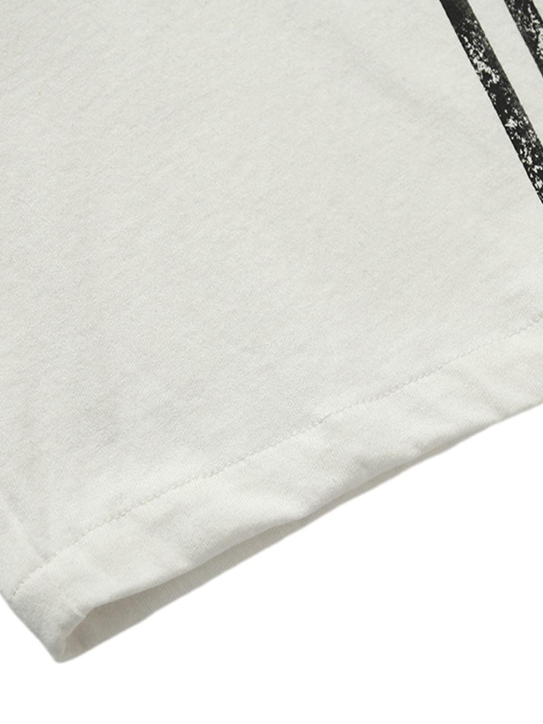 A detailed view of TALISHKO T-shirt's hem and stitching, highlighting quality craftsmanship.