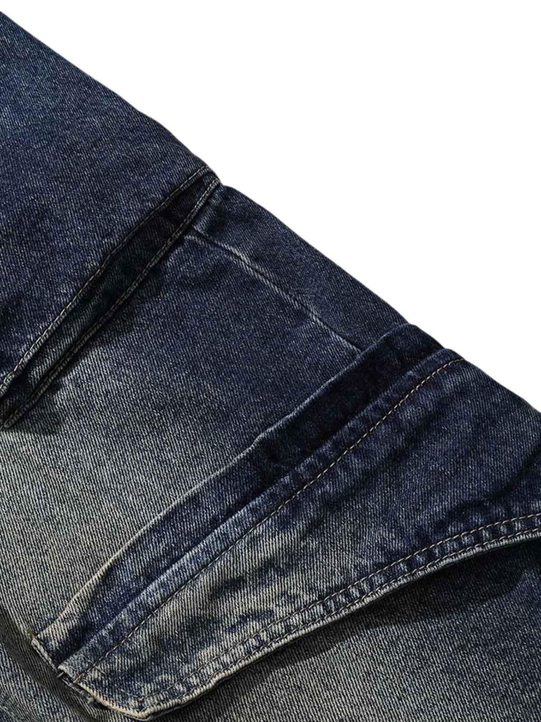 Intricate look at TALISHKO's heavy washed workwear jeans, focusing on the fabric texture.
