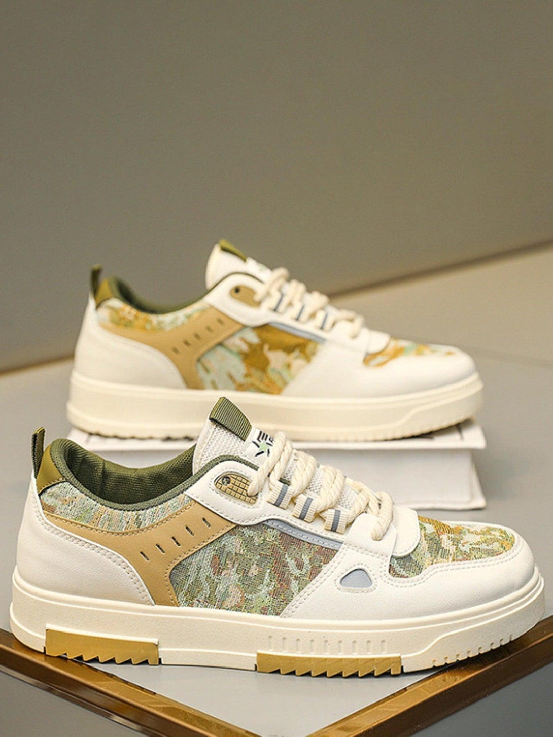 TALISHKO board shoes with a camo pattern and breathable design, adding flair to any casual look.