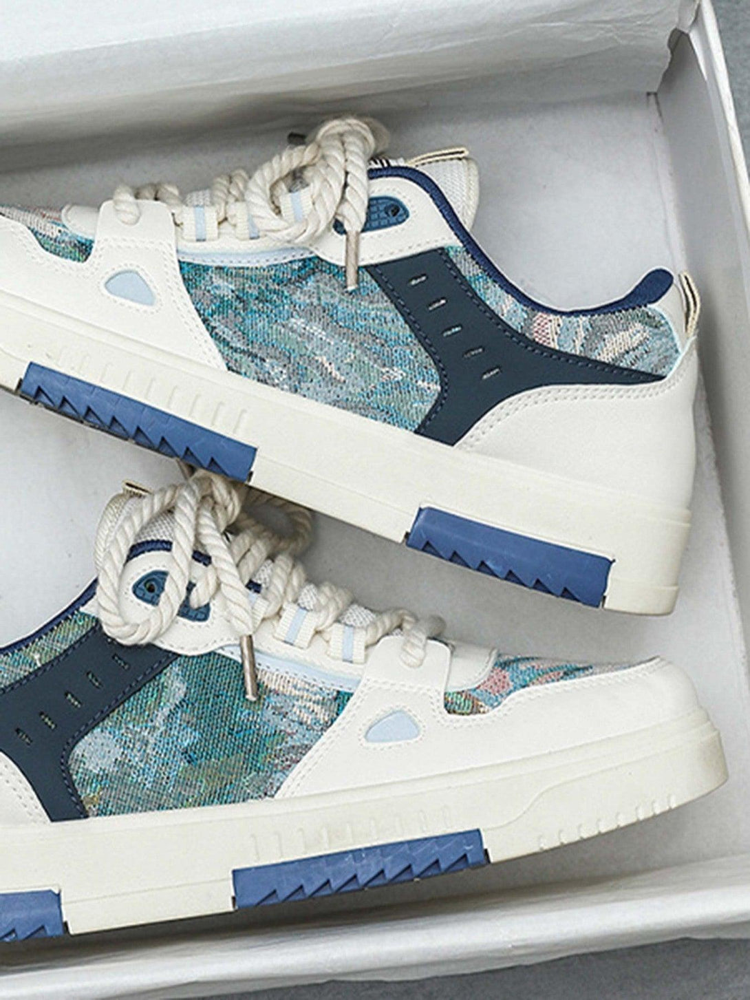 TALISHKO board shoes with a vibrant blue pattern and rope laces, perfect for trendy streetwear.