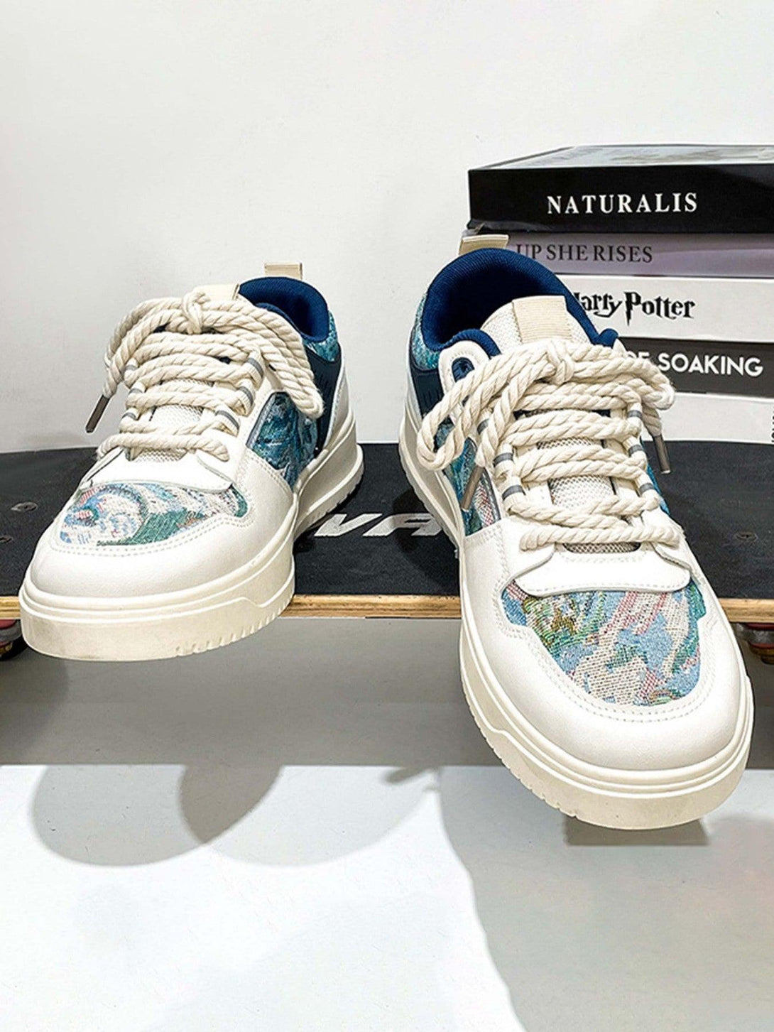 TALISHKO canvas board shoes with rope laces and a colorful pattern, perfect for casual style.