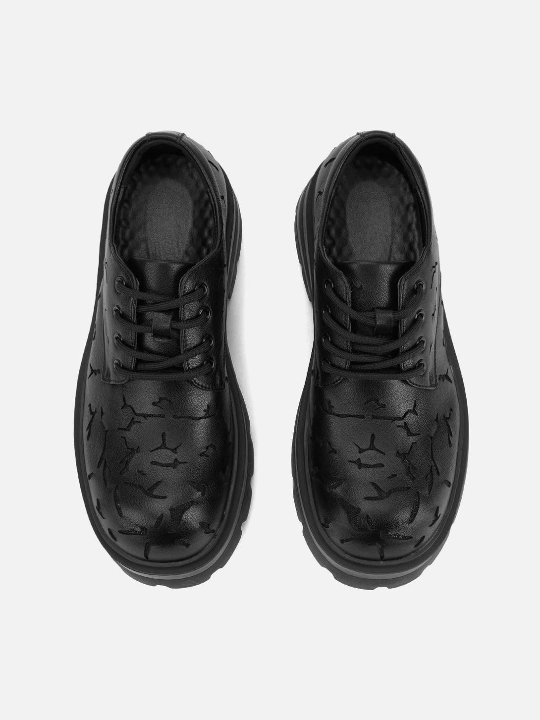 Top view of TALISHKO crackle leather shoes, showcasing unique texture and sturdy design.