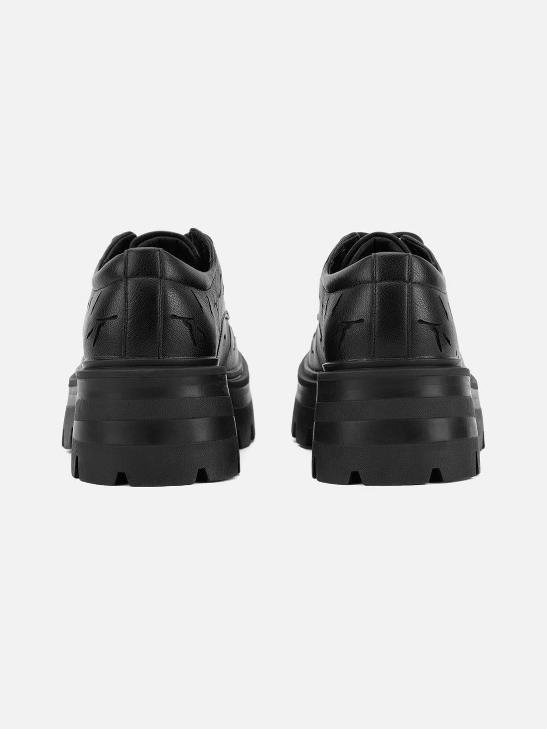 Back view of TALISHKO leather shoes, showcasing chunky soles and textured crackle design.