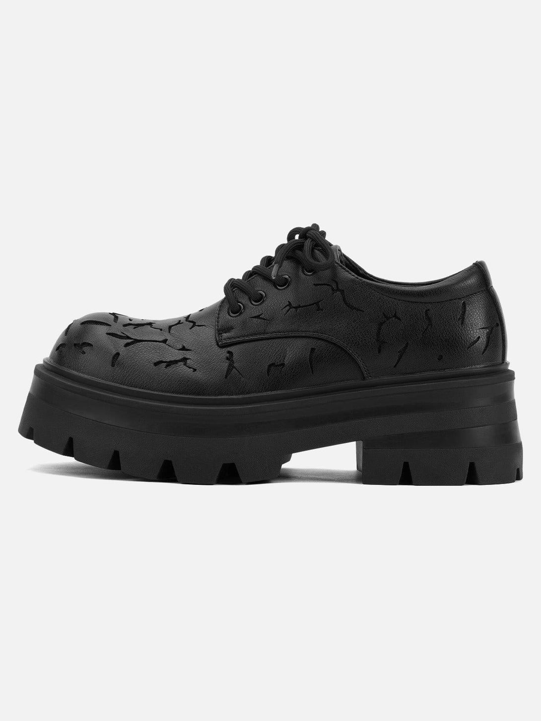 Side view of TALISHKO crackle leather shoes, highlighting the chunky sole and textured pattern.
