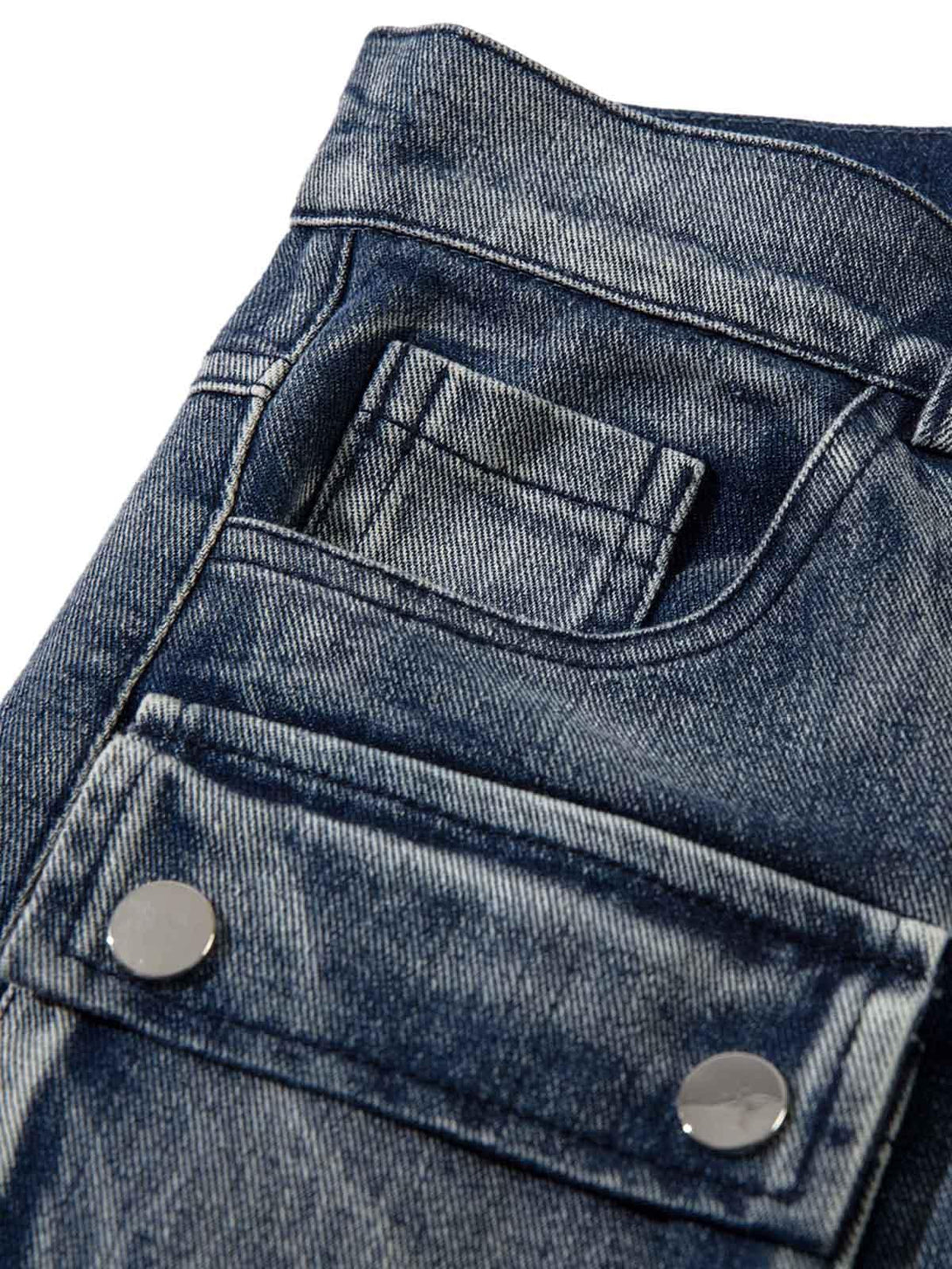 TALISHKO hip-hop jeans close-up highlighting intricate pocket design and textured denim.