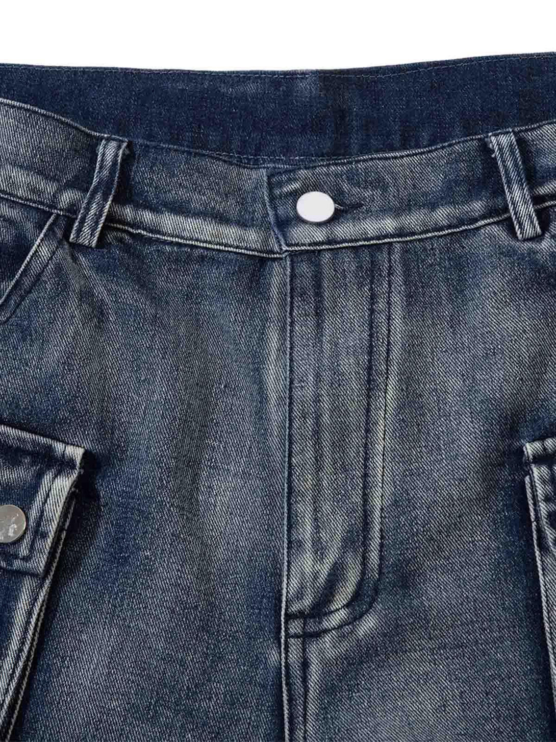 Detailed view of TALISHKO hip-hop jeans, showcasing the front button and stitching details.