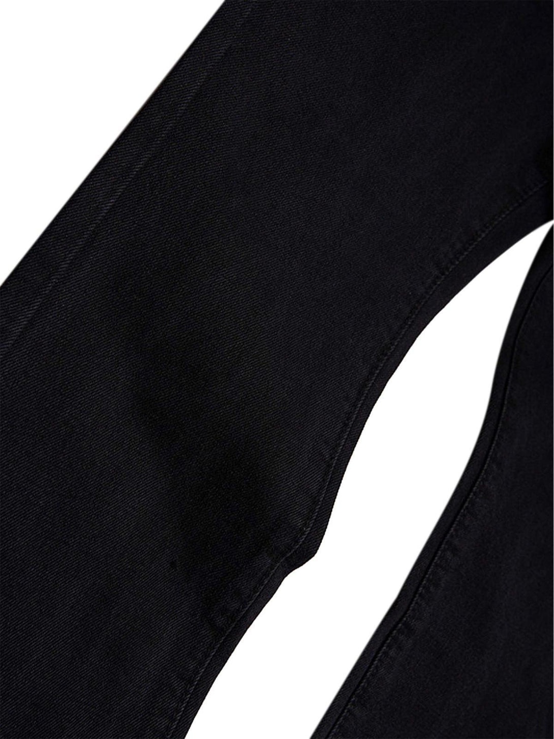 Detailed fabric and stitching of black TALISHKO retro jeans, highlighting quality craftsmanship.