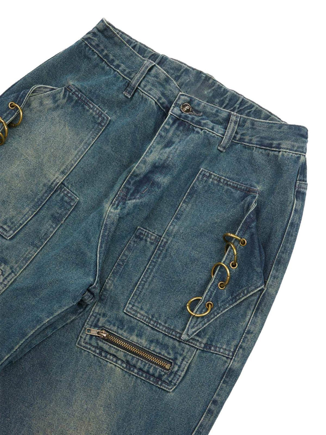 Zoomed-in detail of TALISHKO multi-pocket jeans, highlighting metal rings and zipper accents.