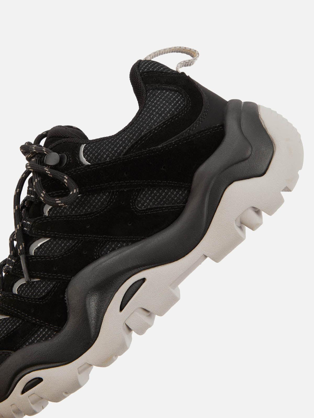 Side view of TALISHKO hiking shoes, featuring a rugged sole and black mesh design.